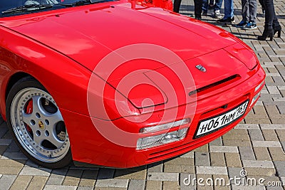 Fore part of the red sports car Porsche 944 at the cityâ€™s Retro Car Show Editorial Stock Photo